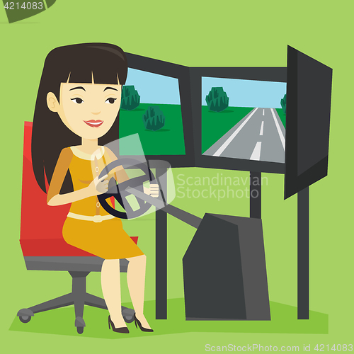 Image of Woman playing video game with gaming wheel.