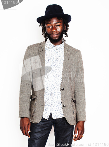 Image of young handsome afro american boy in stylish hipster hat gesturin