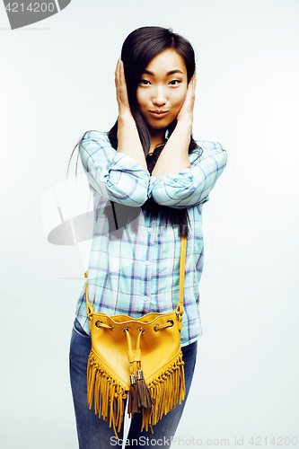 Image of young pretty asian woman posing cheerful emotional isolated on white background, lifestyle people concept