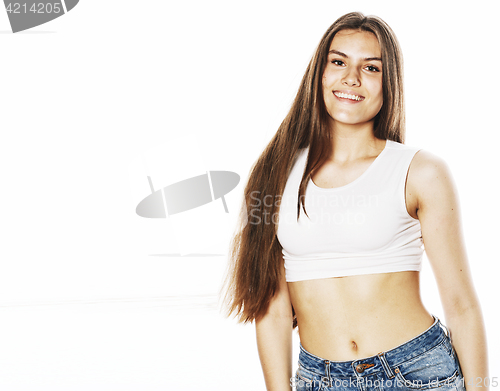 Image of young pretty teenage hipster girl posing emotional happy smiling on white background, lifestyle people concept 