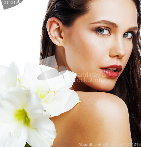 Image of young pretty woman with  Amarilis flower close up isolated on wh