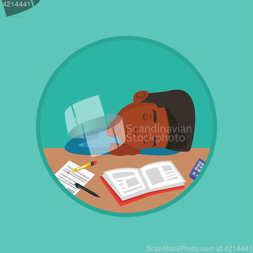 Image of Male student sleeping at the desk with book.