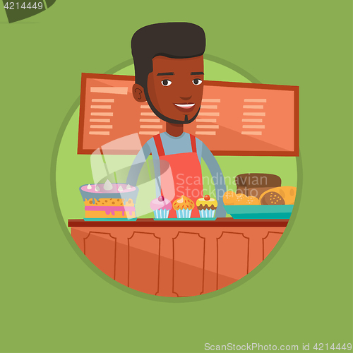 Image of Worker standing behind the counter at the bakery.