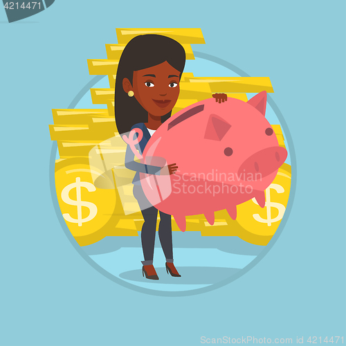 Image of Business woman holding big piggy bank.
