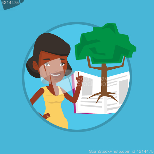Image of Student pointing at tree of knowledge.