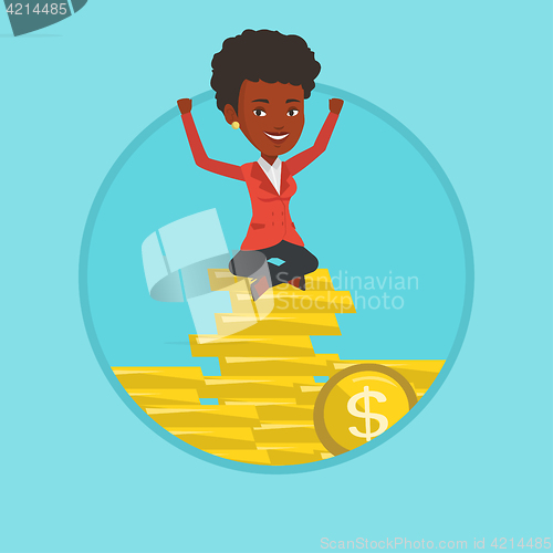 Image of Happy business woman sitting on golden coins.