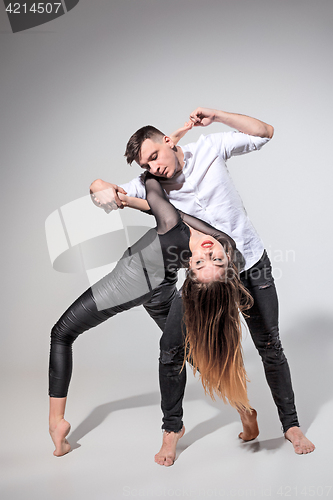 Image of Two people dancing in contemporary stile