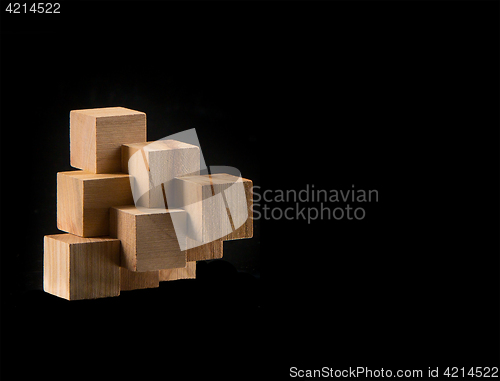 Image of The wooden puzzle - game with blocks