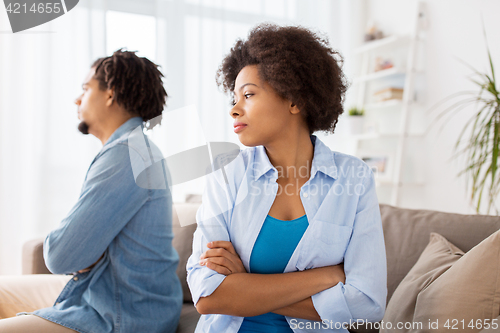 Image of unhappy couple having argument at home