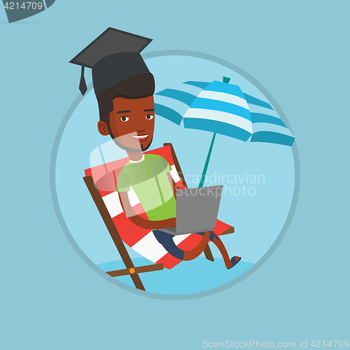 Image of Graduate lying in chaise lounge with laptop.