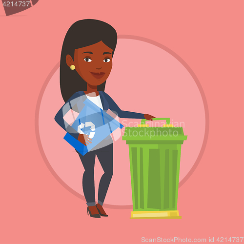 Image of Woman with recycle bin and trash can.