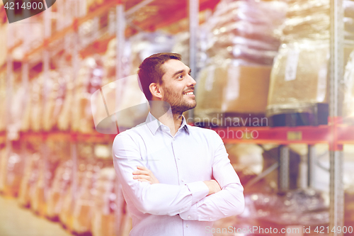 Image of happy man at warehouse