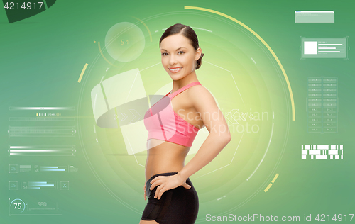 Image of happy smiling sporty woman over green background