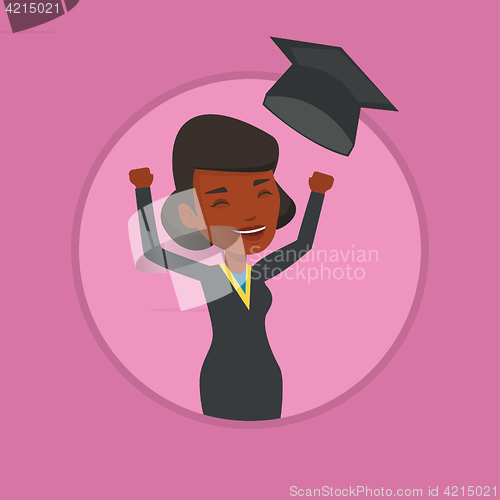 Image of Graduate throwing up graduation hat.