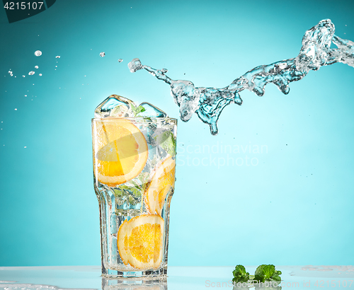 Image of The rose exotic cocktail and fruit on blue