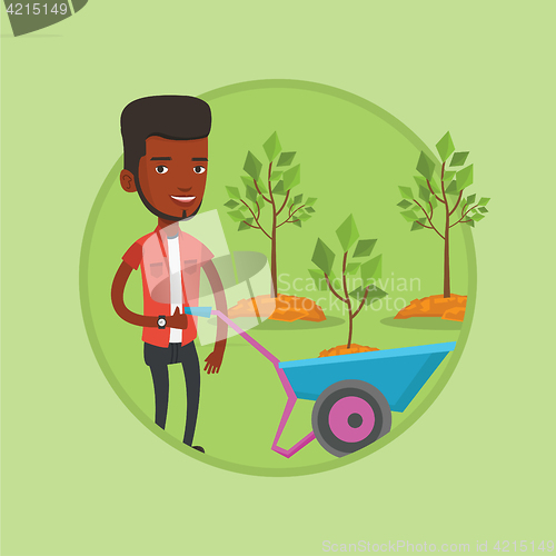 Image of Man pushing wheelbarrow with plant.