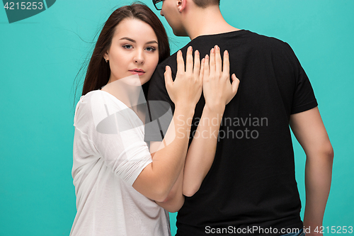Image of Portrait of couple, close to each other. Caucasian models in love, relationship, dating, lovers, romantic concept