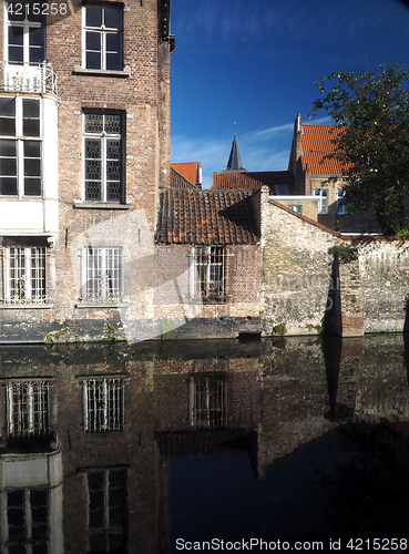 Image of Bruges Belgium historic houses with tile roof canal Europe    