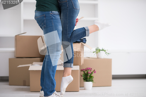 Image of happy Young couple moving in new house