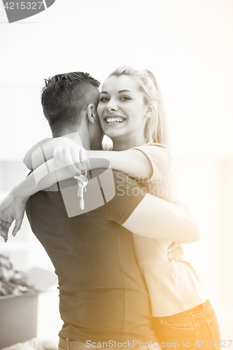 Image of happy Young couple moving in new house