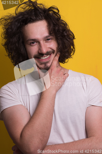 Image of young man with funny hair over color background