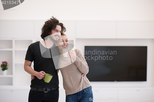 Image of Happy couple in their new home