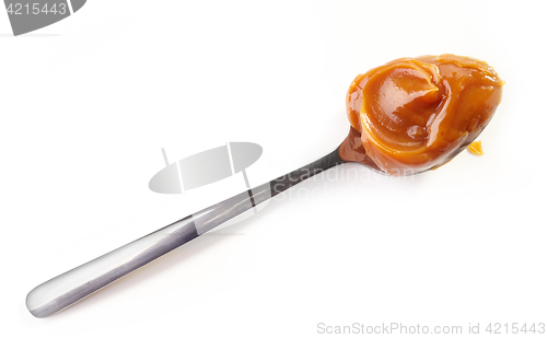 Image of spoon of soft homemade caramel
