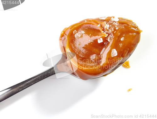 Image of spoon of soft homemade caramel