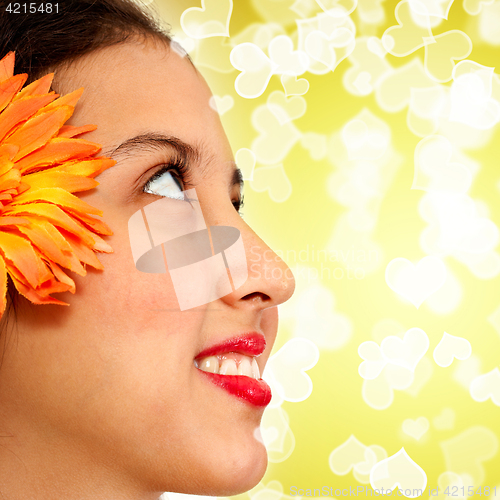 Image of Young Refreshing Face Of A Girl In Sunlight And Hearts Bokeh