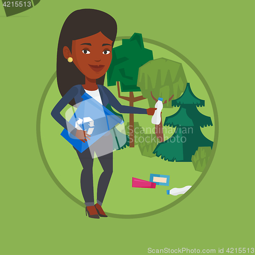 Image of Woman collecting garbage in forest.