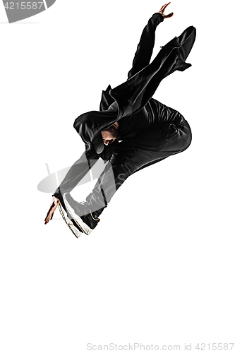 Image of The silhouette of one hip hop male break dancer dancing on white background