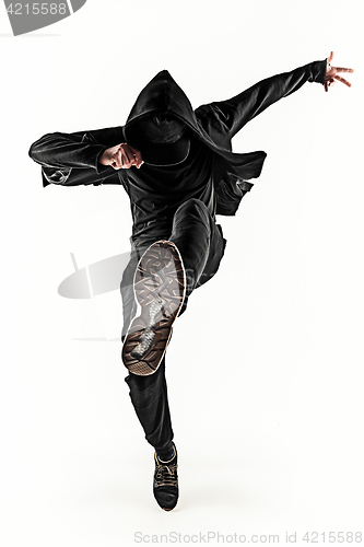 Image of The silhouette of one hip hop male break dancer dancing on white background