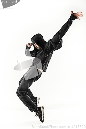 Image of The silhouette of one hip hop male break dancer dancing on white background