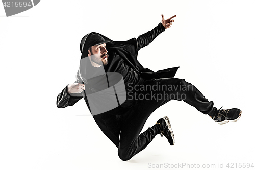 Image of The silhouette of one hip hop male break dancer dancing on white background