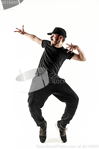 Image of The silhouette of one hip hop male break dancer dancing on white background