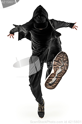 Image of The silhouette of one hip hop male break dancer dancing on white background