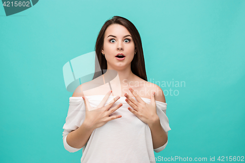 Image of Portrait of young woman with shocked facial expression