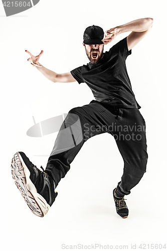 Image of The silhouette of one hip hop male break dancer dancing on white background