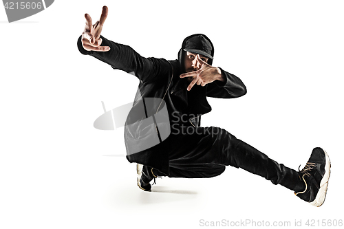 Image of The silhouette of one hip hop male break dancer dancing on white background