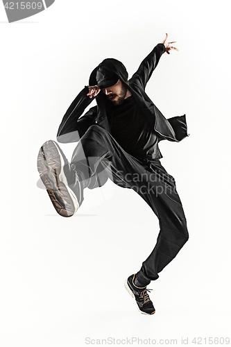 Image of The silhouette of one hip hop male break dancer dancing on white background