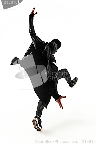 Image of The silhouette of one hip hop male break dancer dancing on white background