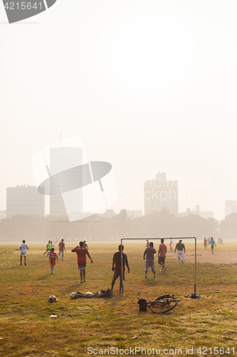 Image of Boys playing soccer, Kolkata, India
