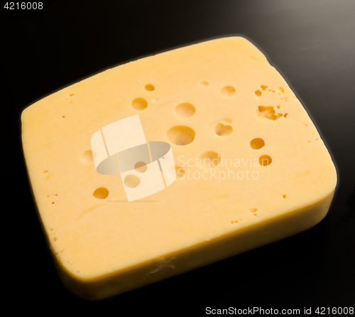 Image of cheese on black