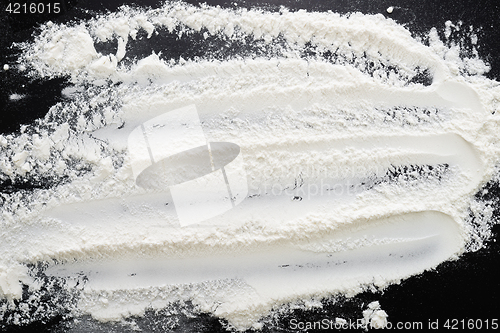 Image of flour on black