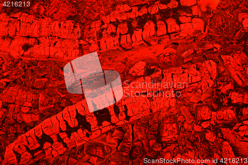 Image of Firewood background with charcoal in red color