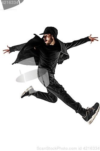 Image of The silhouette of one hip hop male break dancer dancing on white background