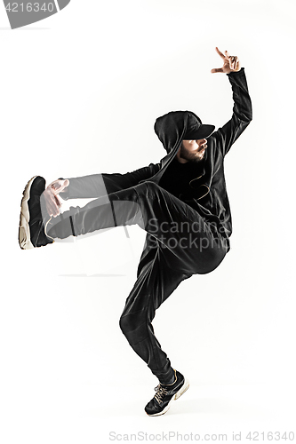 Image of The silhouette of one hip hop male break dancer dancing on white background