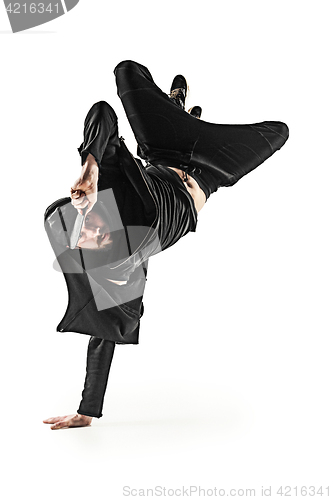 Image of The silhouette of one hip hop male break dancer dancing on white background