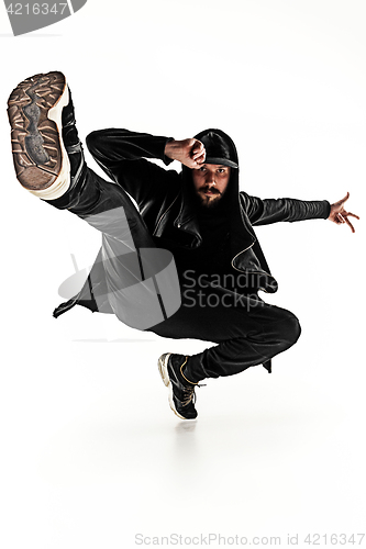 Image of The silhouette of one hip hop male break dancer dancing on white background