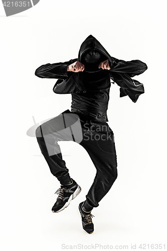 Image of The silhouette of one hip hop male break dancer dancing on white background